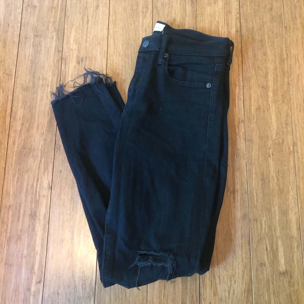 black ripped jeans